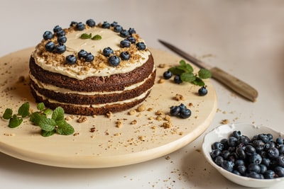 White ceramic plate brown white cake
